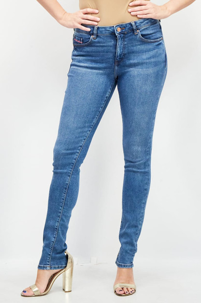 Женские джинсы Skinny Fit из стираного эластичного денима светло-голубого цвета