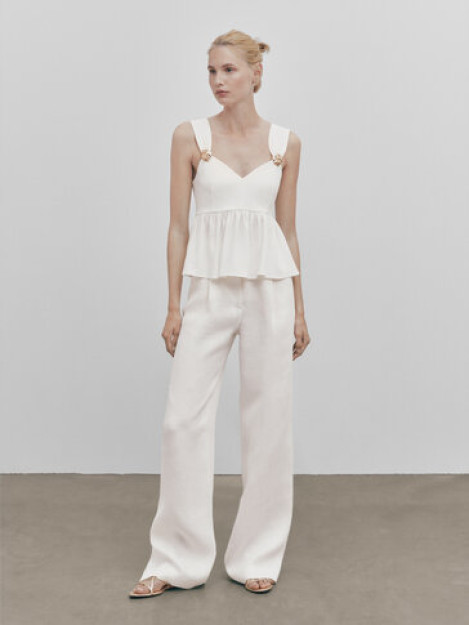 Peplum va yaltiroq toshlar bilan bluzka-Studio S