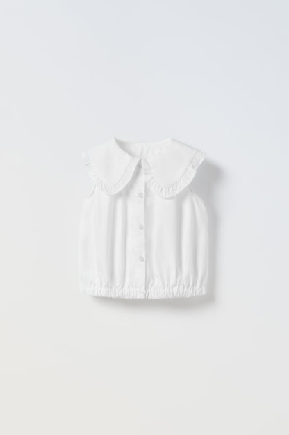 3-4 yillik ko'krak nishoni bilan poplin ko'ylak (104 sm)